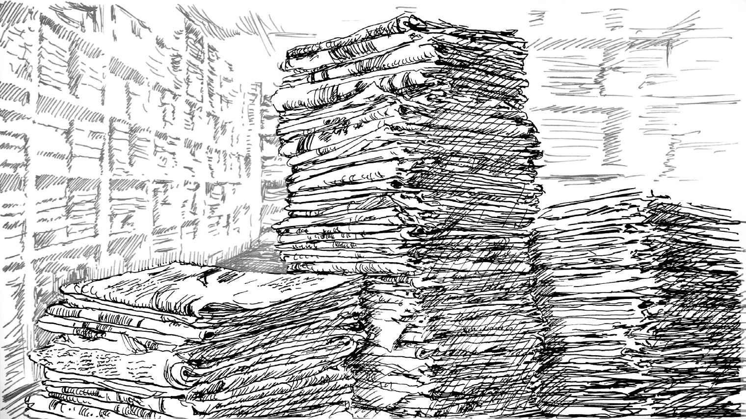 Three newspaper stacks of different heights