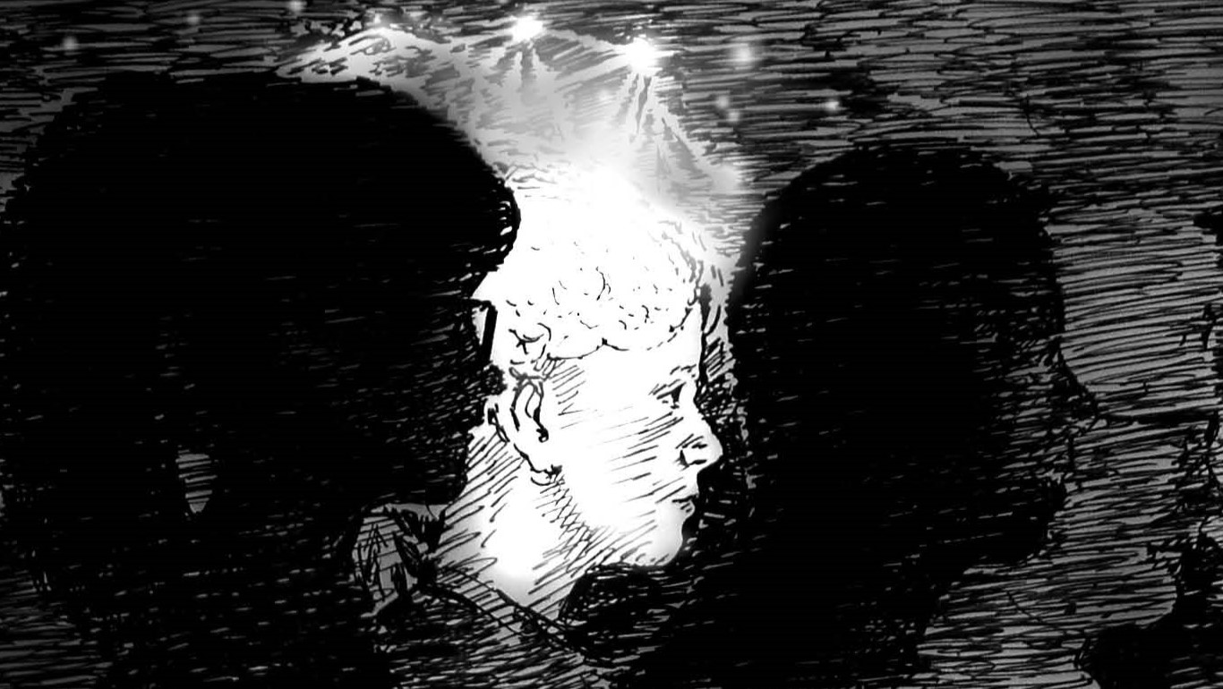 Several people can be seen. Only one of them is brightly lit.